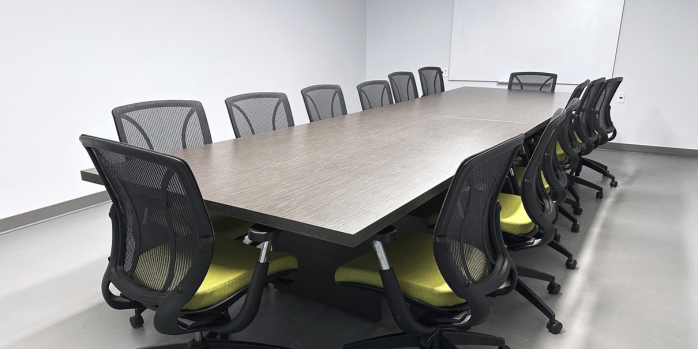 Boardroom with table and chairs set up